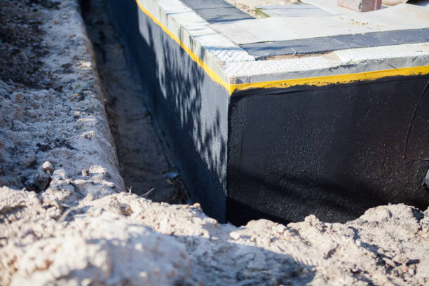 Professional Waterproofing technician working in Kansas, AL